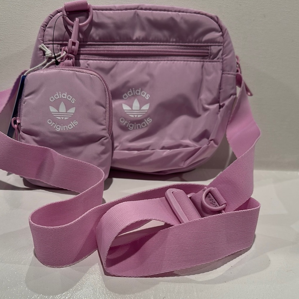 NWT Adidas Lilac Puffer and Pouch Crossbody Bag with inside zipper pocket.
